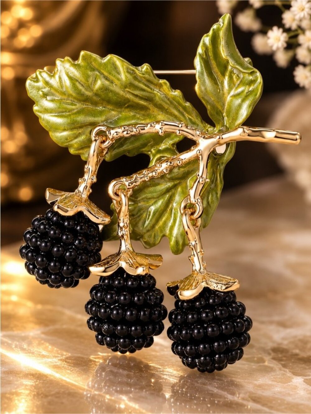Gold-Tone Green Leaf Brooch with Black Berry Clusters